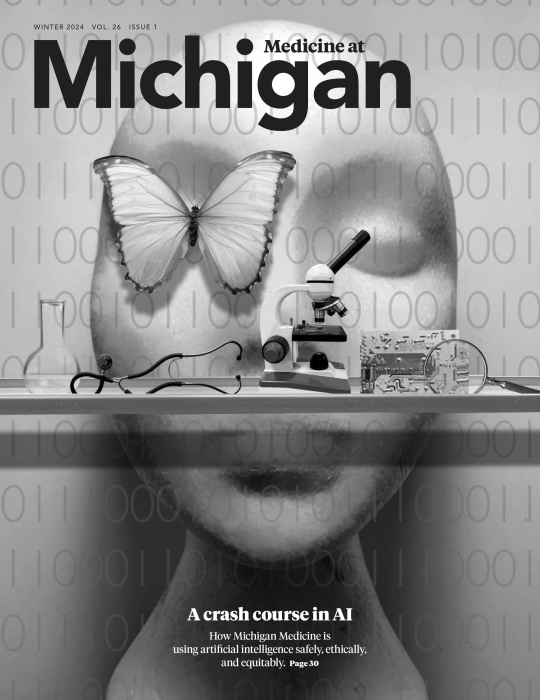 Cover of the Medicine at Michigan Magazine with a sculptural illustration shows a large mannequin-like face with a butterfly over one eye. In front of the face is a table with a beaker, stethoscope, microscope, inner workings of a computer, and a magnifying glass.