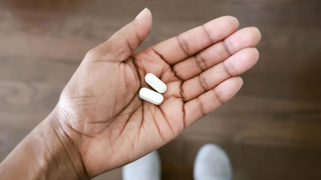 pills in hand