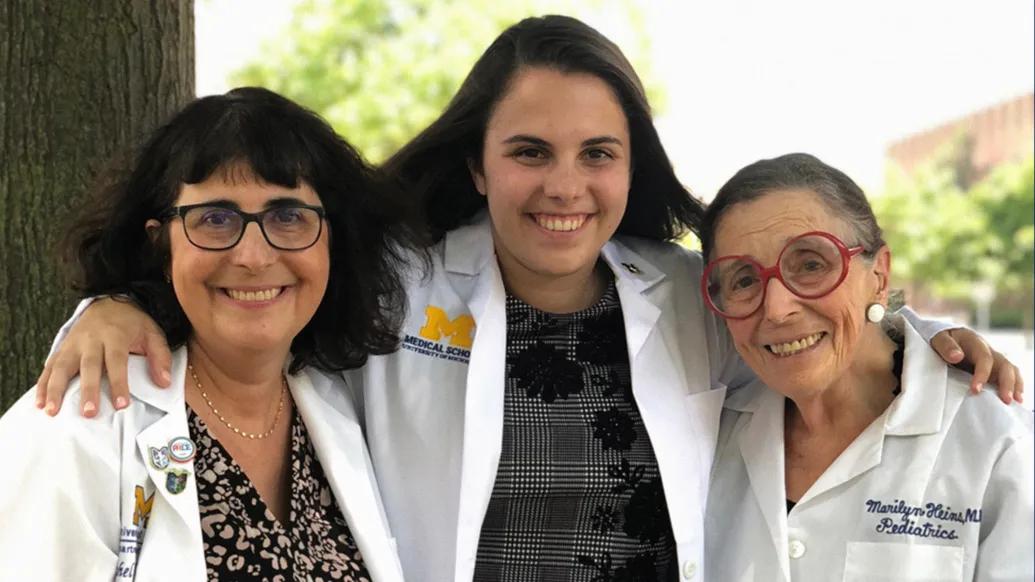 three women posing together