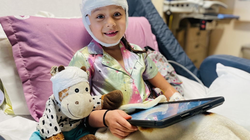 Mott patient using iPad during hospital stay