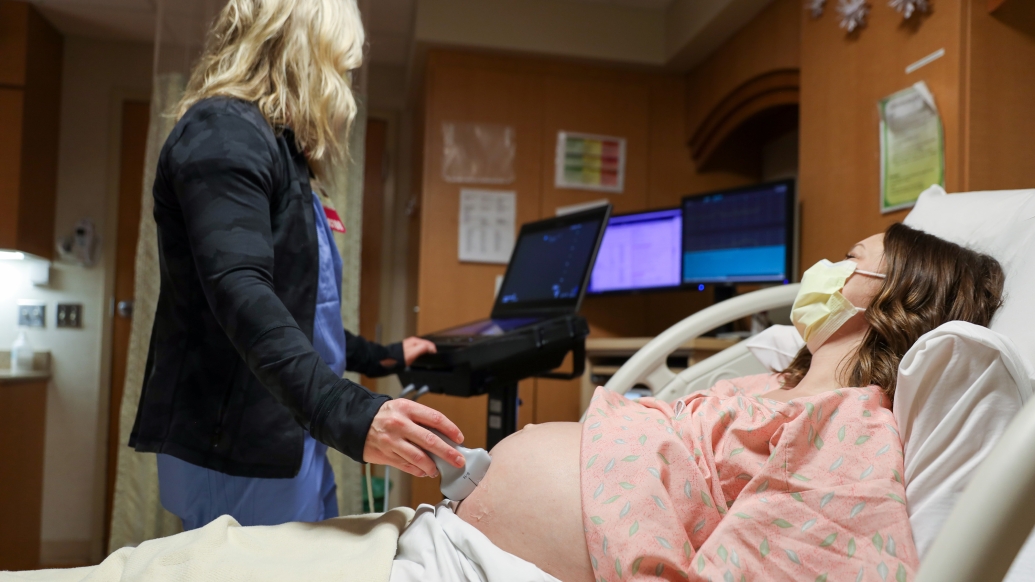 provider looking at person stomach