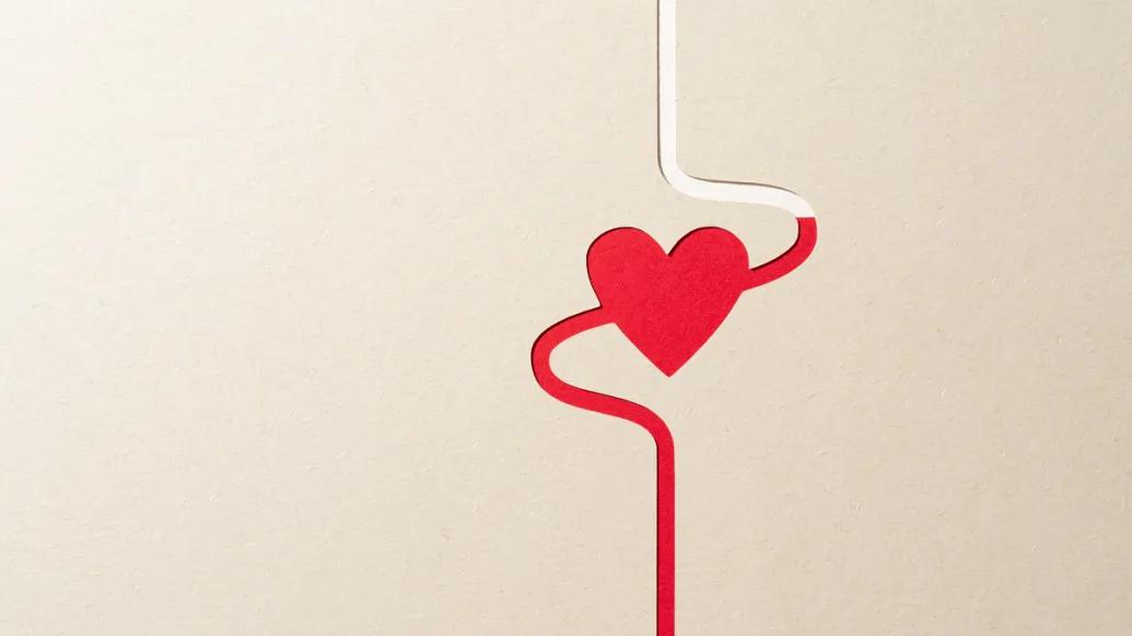 red lines with heart through it beige background