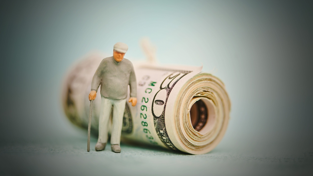 money roll older person with cane molded small