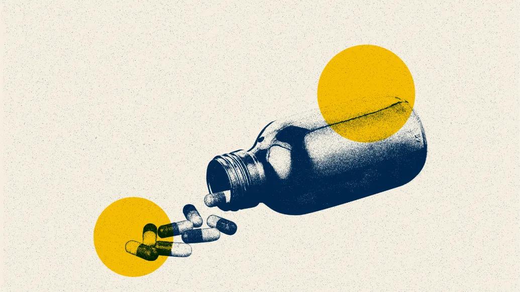 pill bottle spilling yellow blue