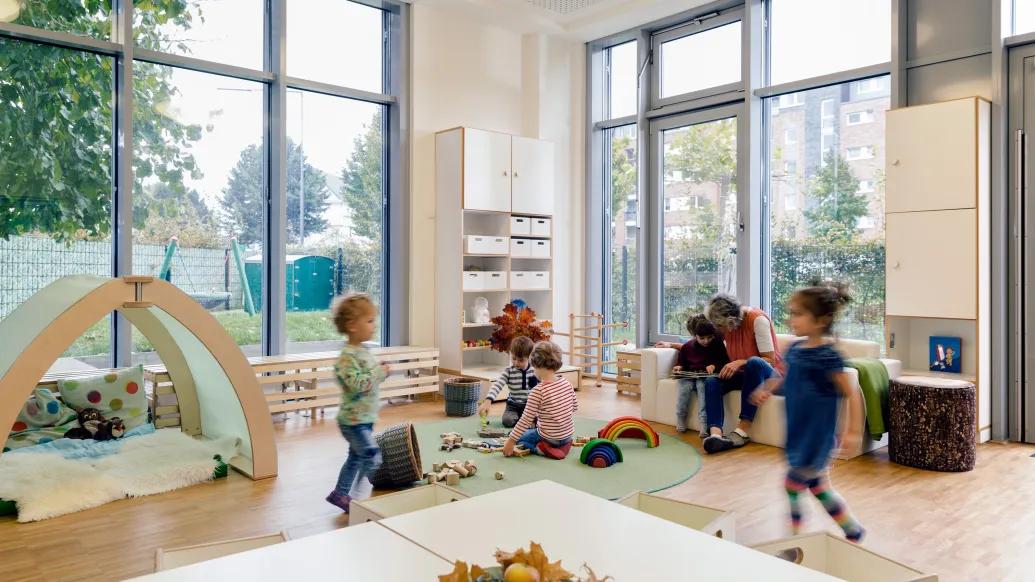 daycare kids running around in room