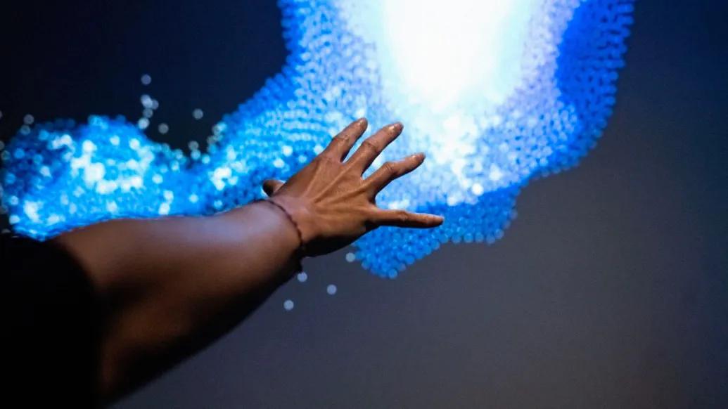 blue image person reaching