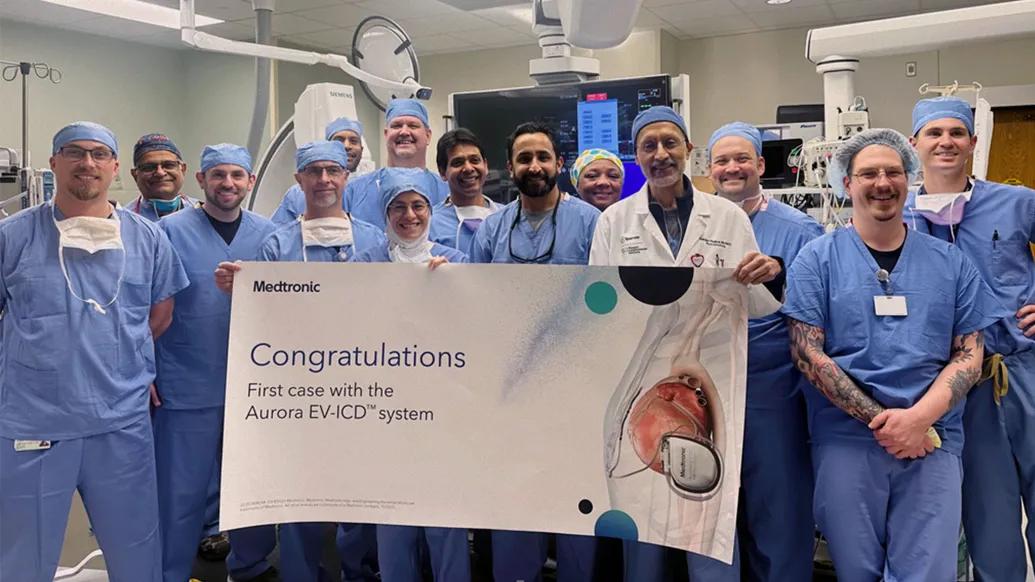 Ali Sheikh, D.O., celebrates with Sparrow’s highly skilled cardiovascular team after becoming the first health system in Michigan to implant the innovative Aurora EV-ICD device defibrillator.