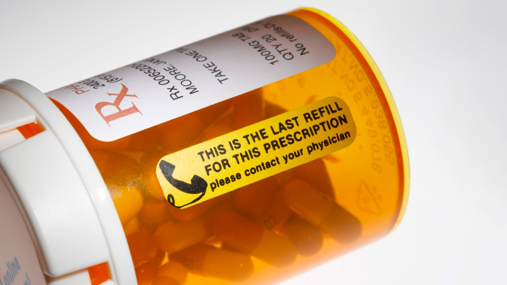 Illustration of prescription bottle with a refill notice