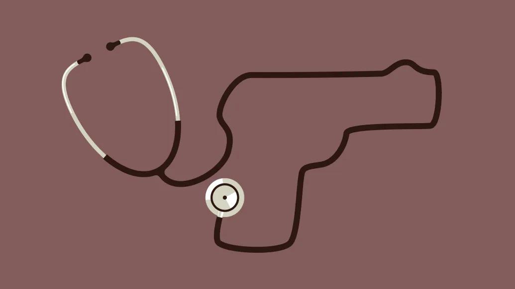 grey and black stethoscope with dark brown background 