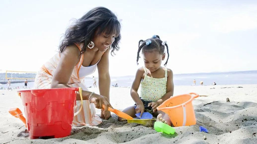 Mother and Child Playing in Sand