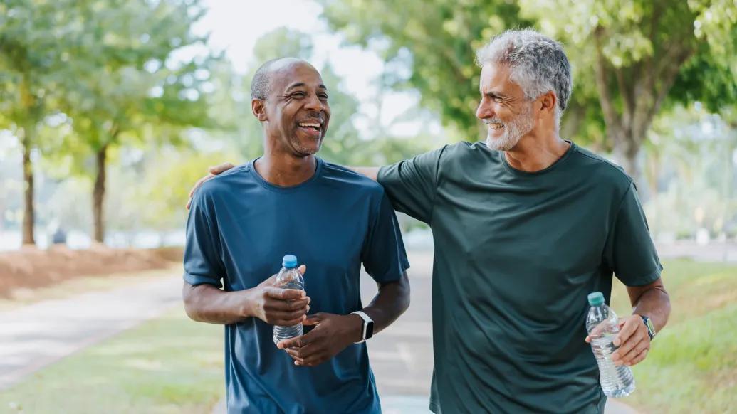 two men together walking outside