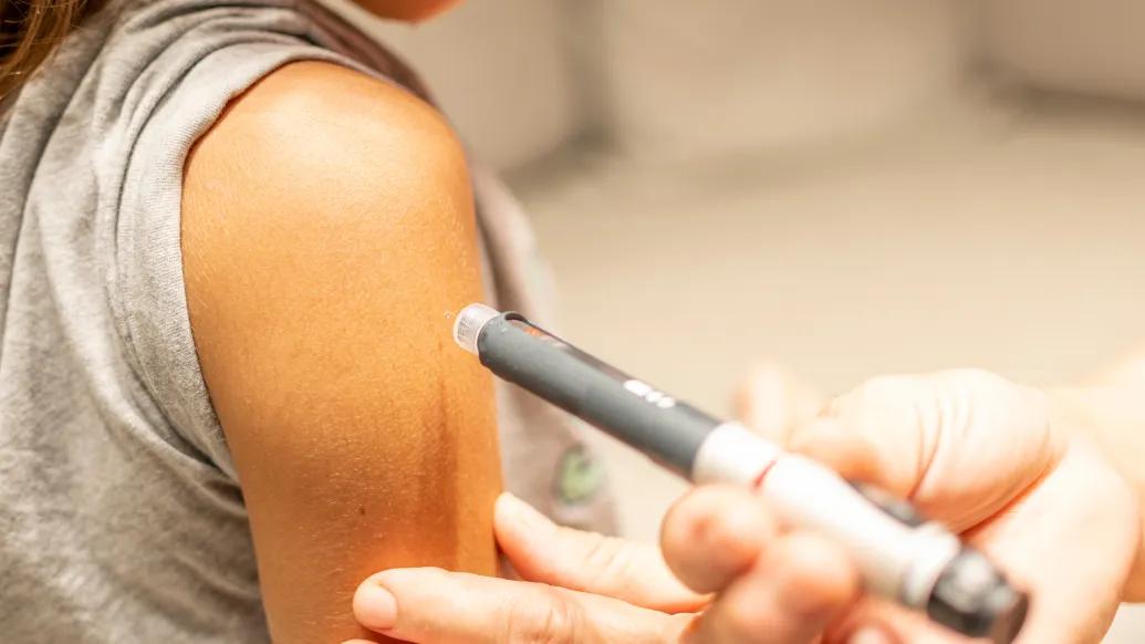 shot in arm patient rolled up sleeve
