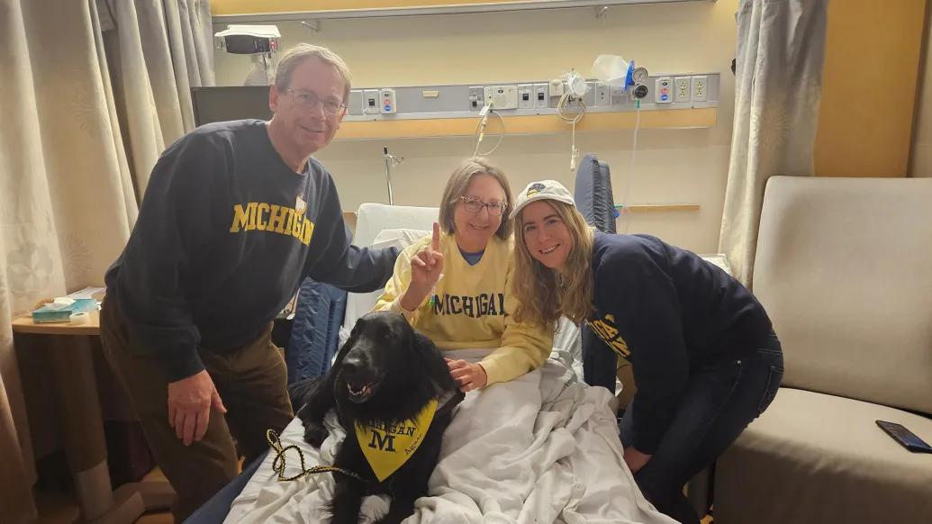 The Achtenberg family dressed in Michigan gear at University Hospital.