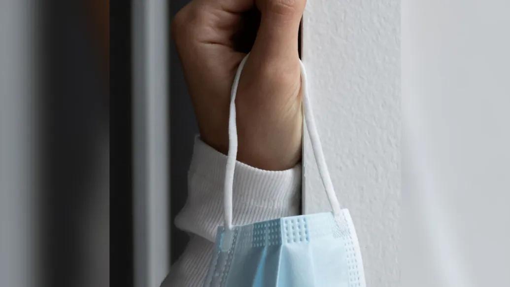 mask being held