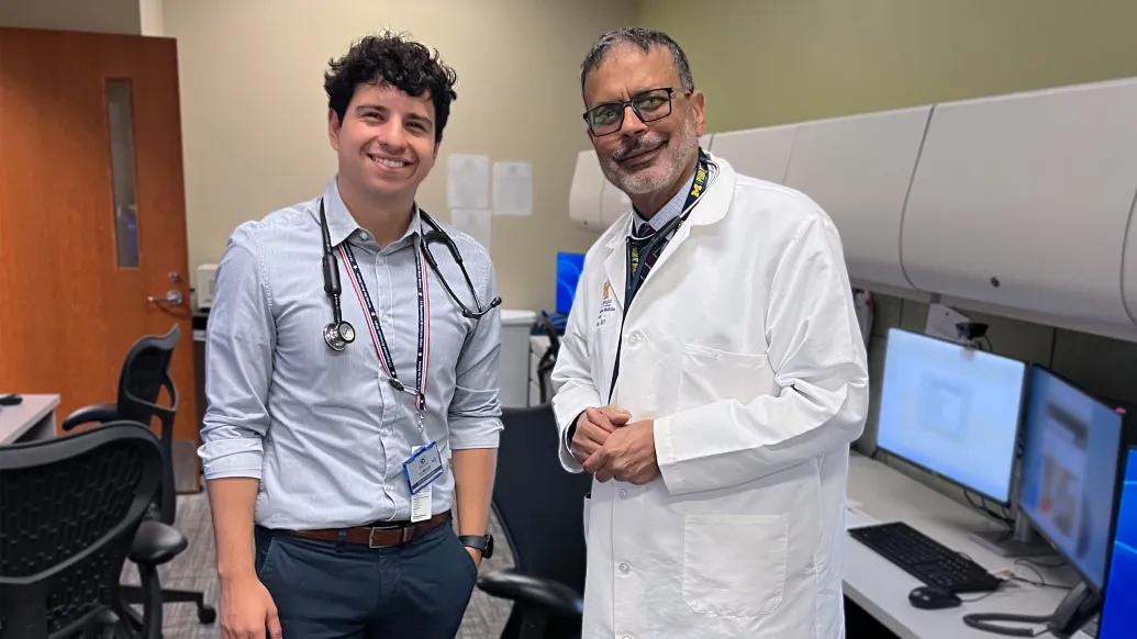 medical student with attending in white coat