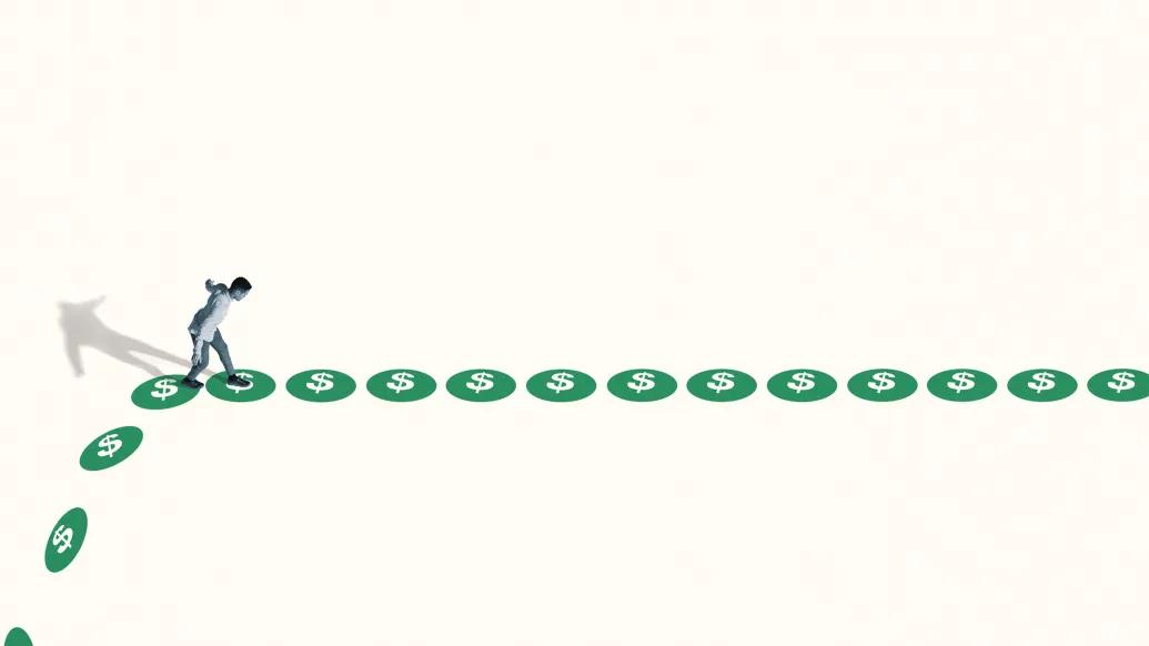 person walking on green circles far away in white space
