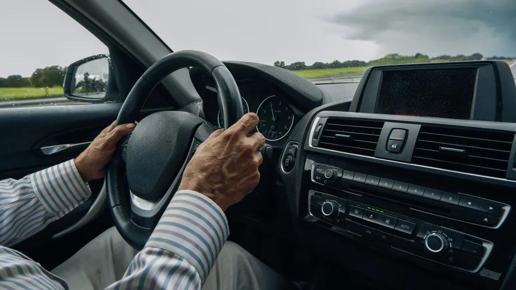 hands on steering wheel