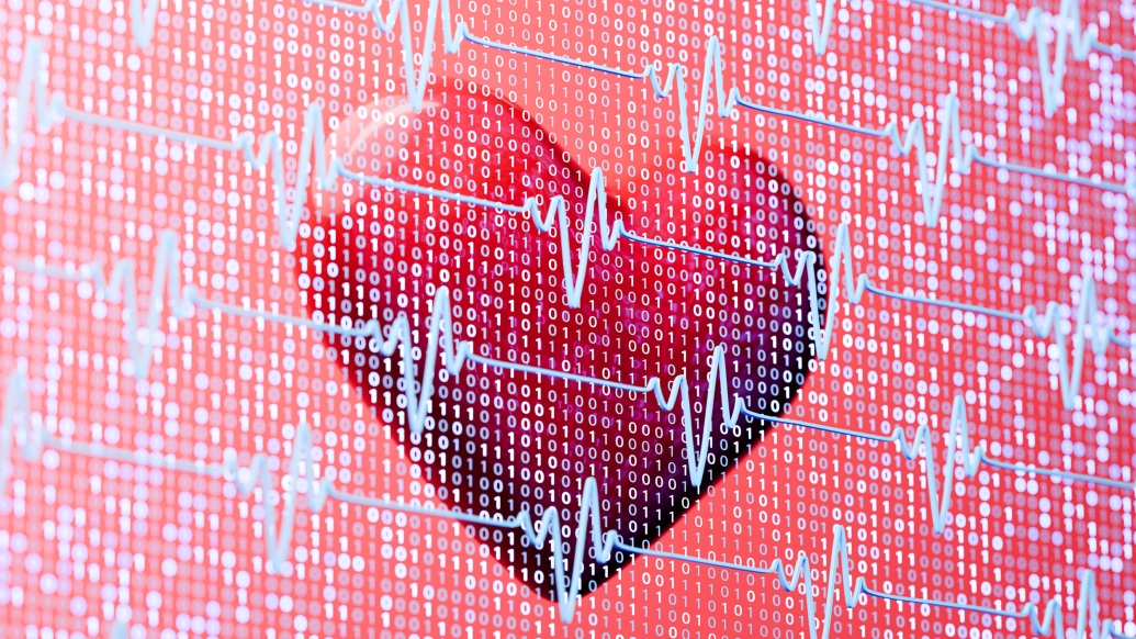 red heart on monitor see through with blue lines