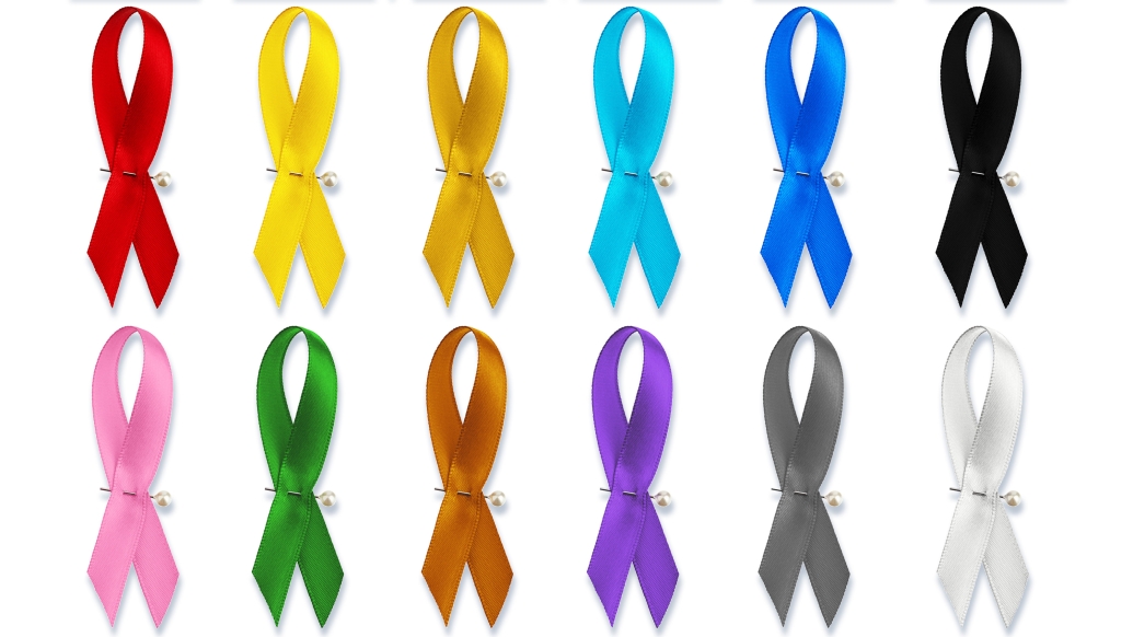 ribbons in colorful colors lined up next to eachother