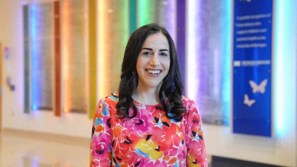 woman smiling colorful background 
