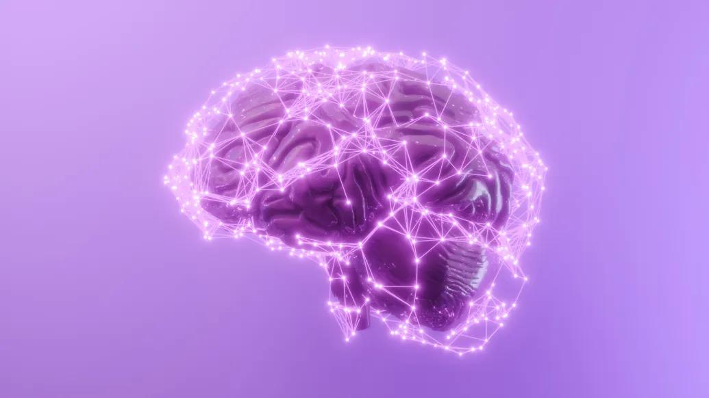 Computer generated image of a human brain with lighted up dots