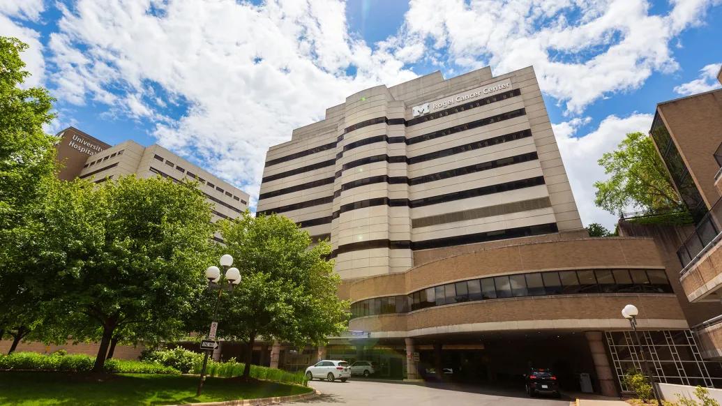 Rogel Cancer Center with trees and blue sky