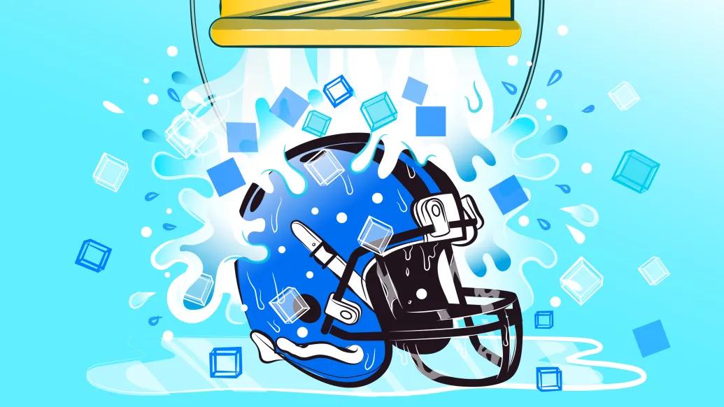 blue background bucket poured on helment