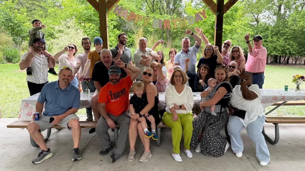 family together celebrating birthday