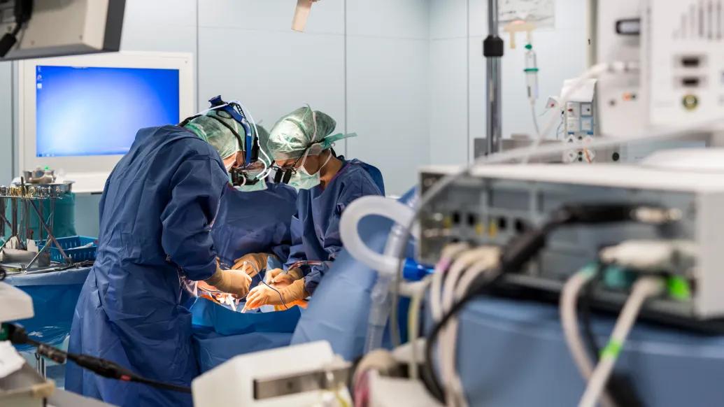 surgeons in surgery operating room 