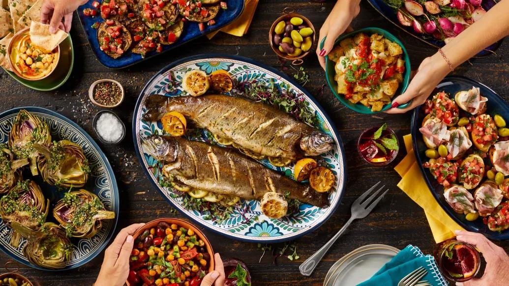 fish dinner Mediterranean food on table 