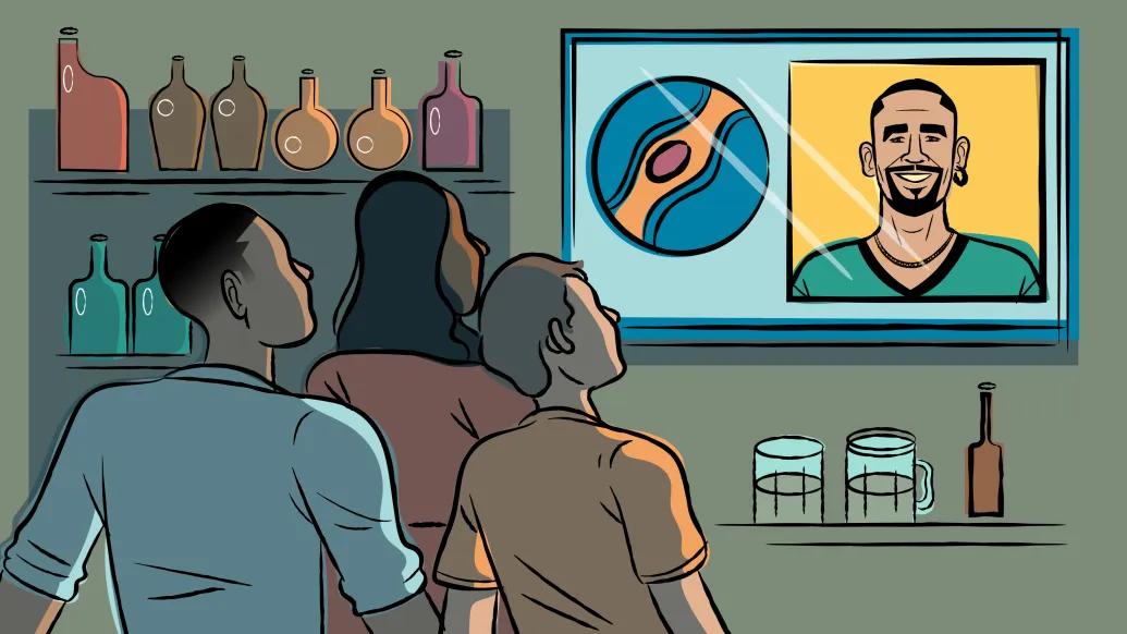 Three people in a bar watch a television displaying a sports logo and a person smiling. Shelves with bottles and a counter with glasses are visible.