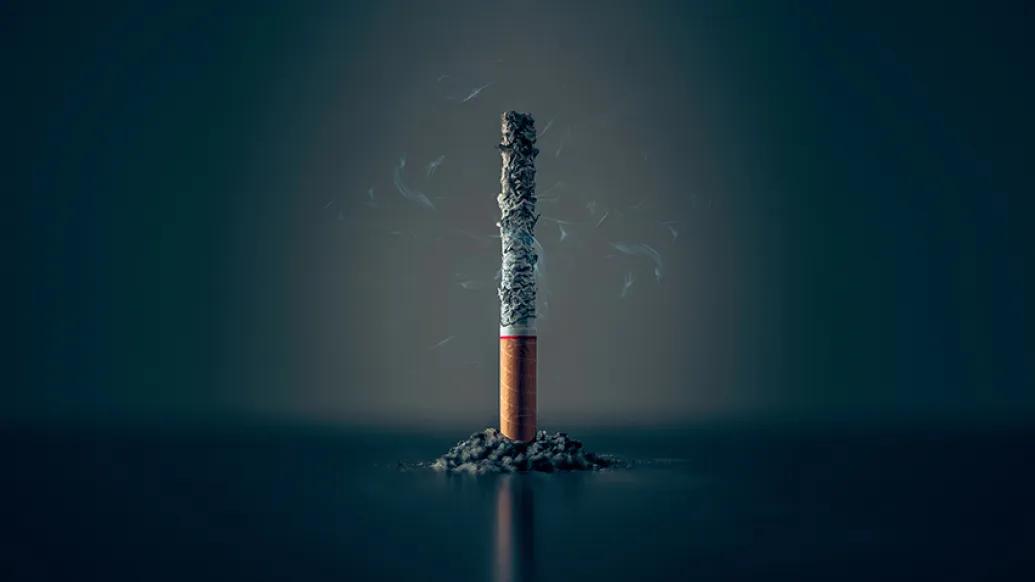 burnt cigarette smoke black grey background