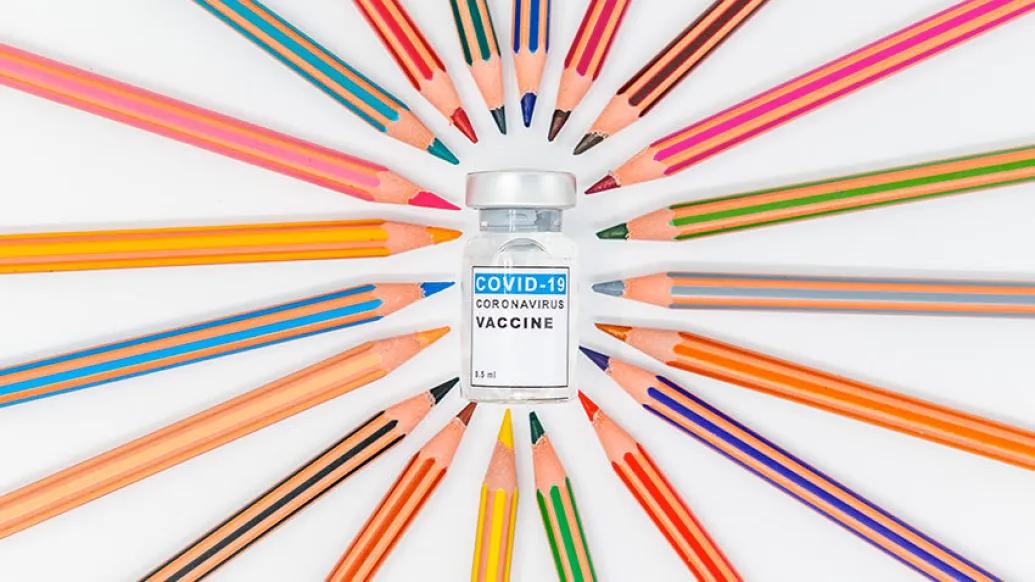 colored pencils coronavirus vaccine vial 