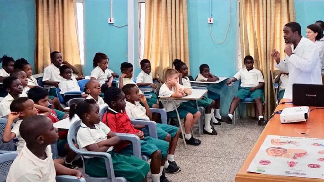 Dr. Truesdale teaching kids in classroom