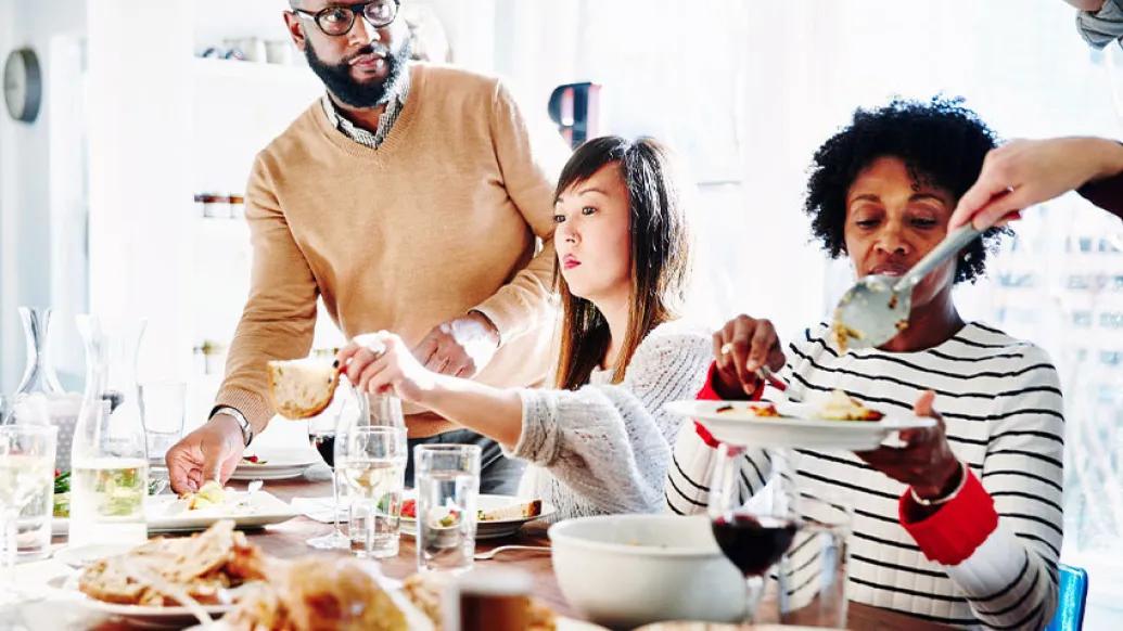 friends adults thanksgiving dinner table