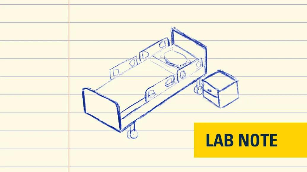 hospital bed drawing in blue ink with yellow badge with blue ink writing