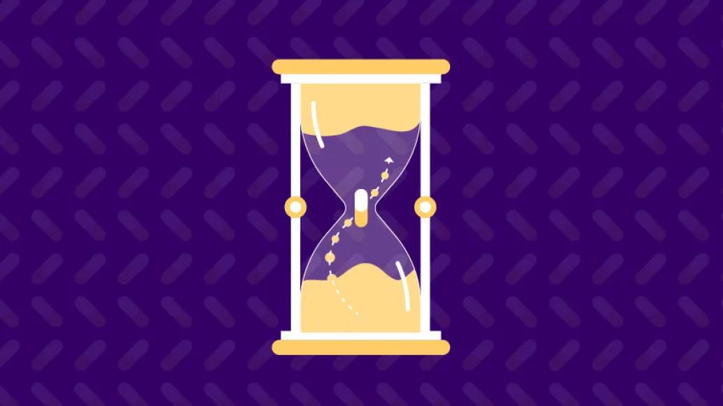 yellow sand clock on dark blue background