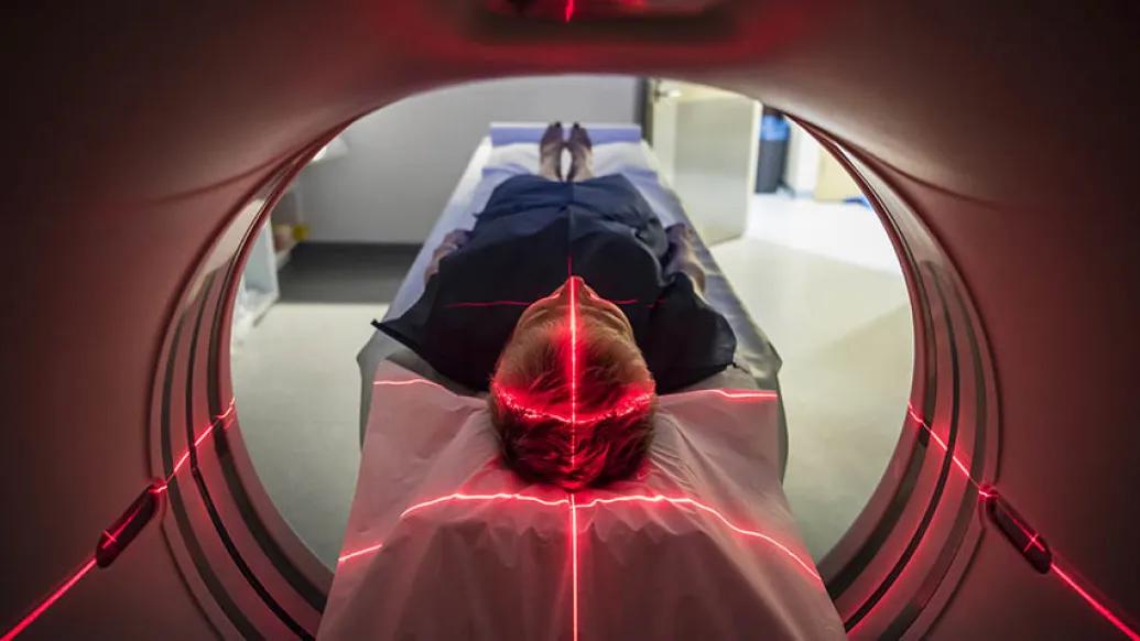 Person going into MRI looking from inside