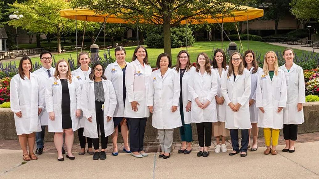 Pharmacists White Coats under Tree Outdoors