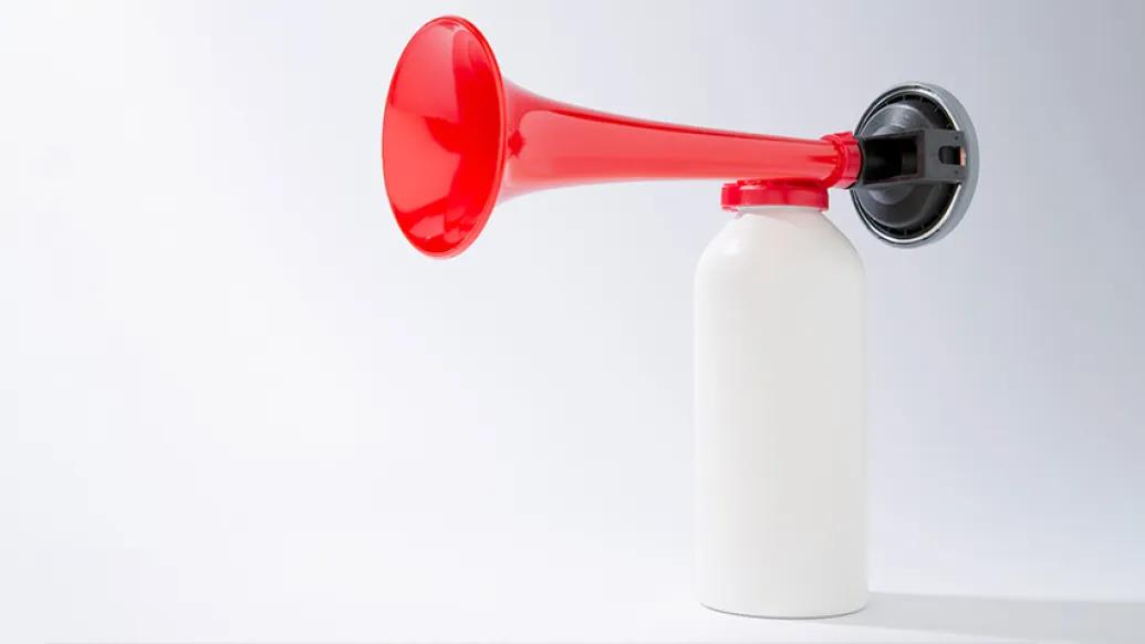 red air horn white room