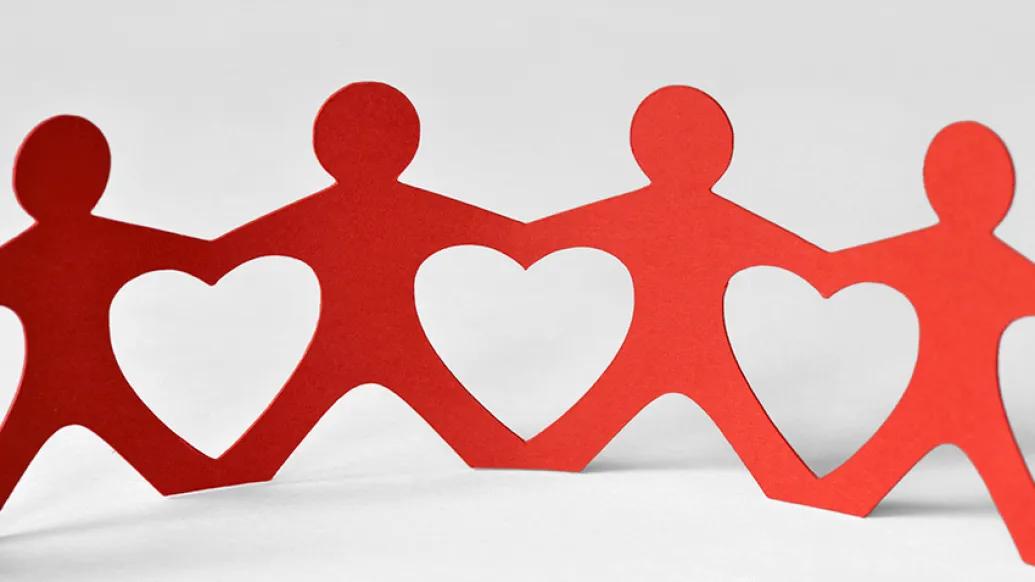 red paper dolls heart linked