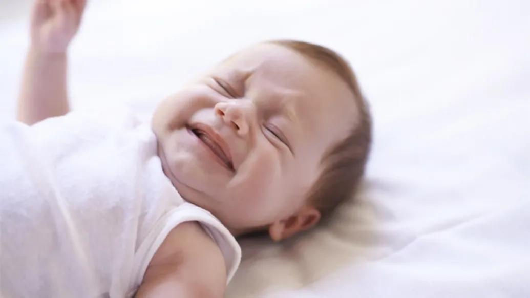 crying baby laying down