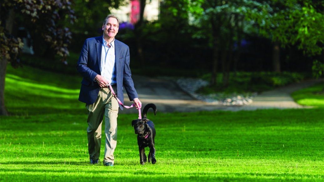 Eric Barth walking his dog after recovering from a drug-induced liver injury from Z-Paks