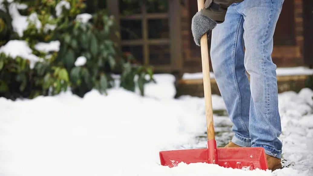 A man shoveling snow
