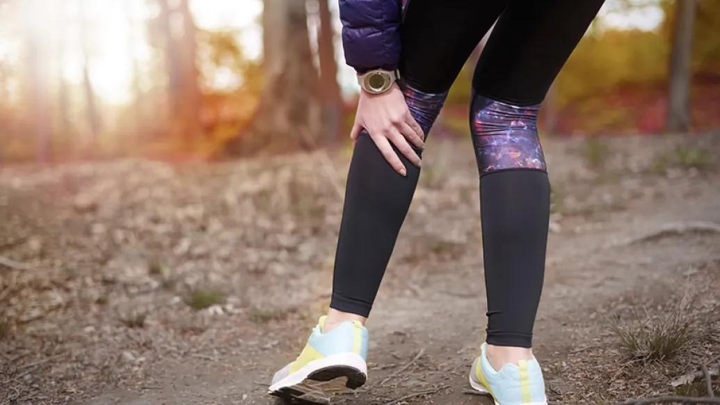 Woman experiencing leg pain from peripheral artery disease
