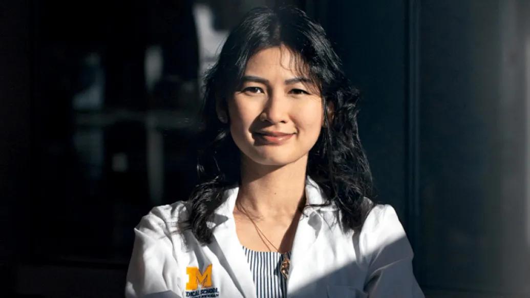 woman doctor hallway labcoat