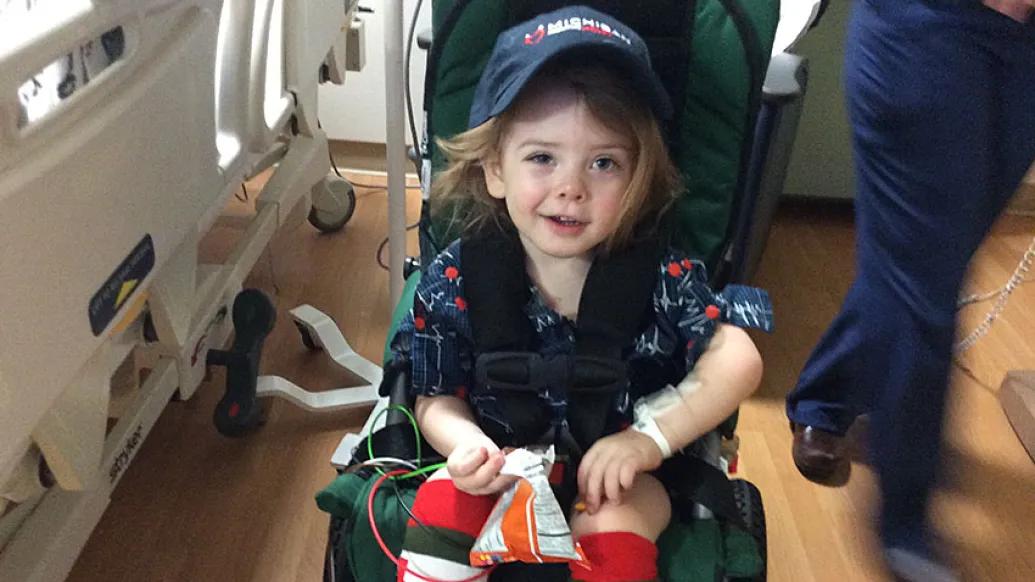 Little girl in wheel chair