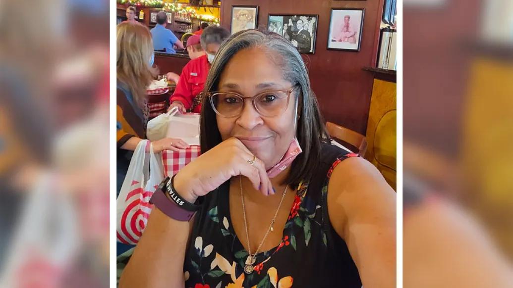woman smiling glasses bracelets she loves to do