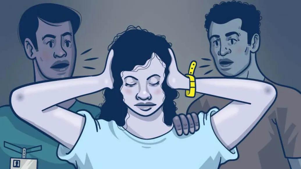 Girl next to her parents covering ears with her hands