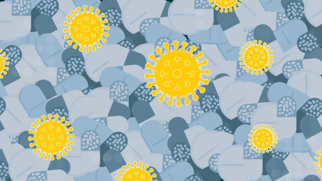 grey pills background with COVID-19 yellow cells popping out on top